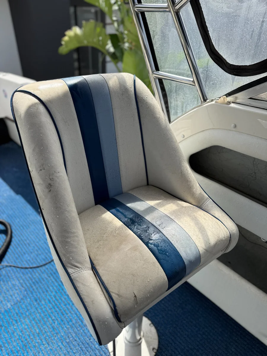 Before boat interior detailing Perth WA — stained oxidised upholstery seat