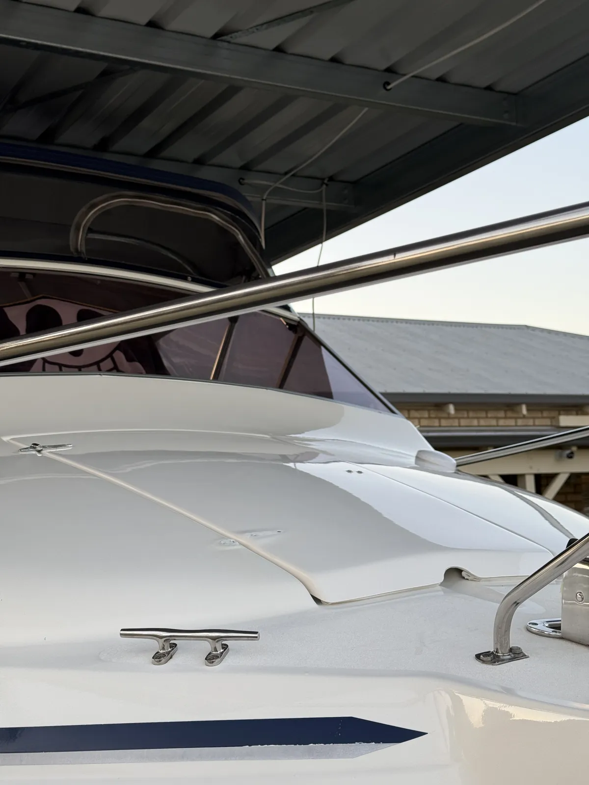Boat detailing Perth WA — Caribbean foredeck gelcoat gloss and polished cleat