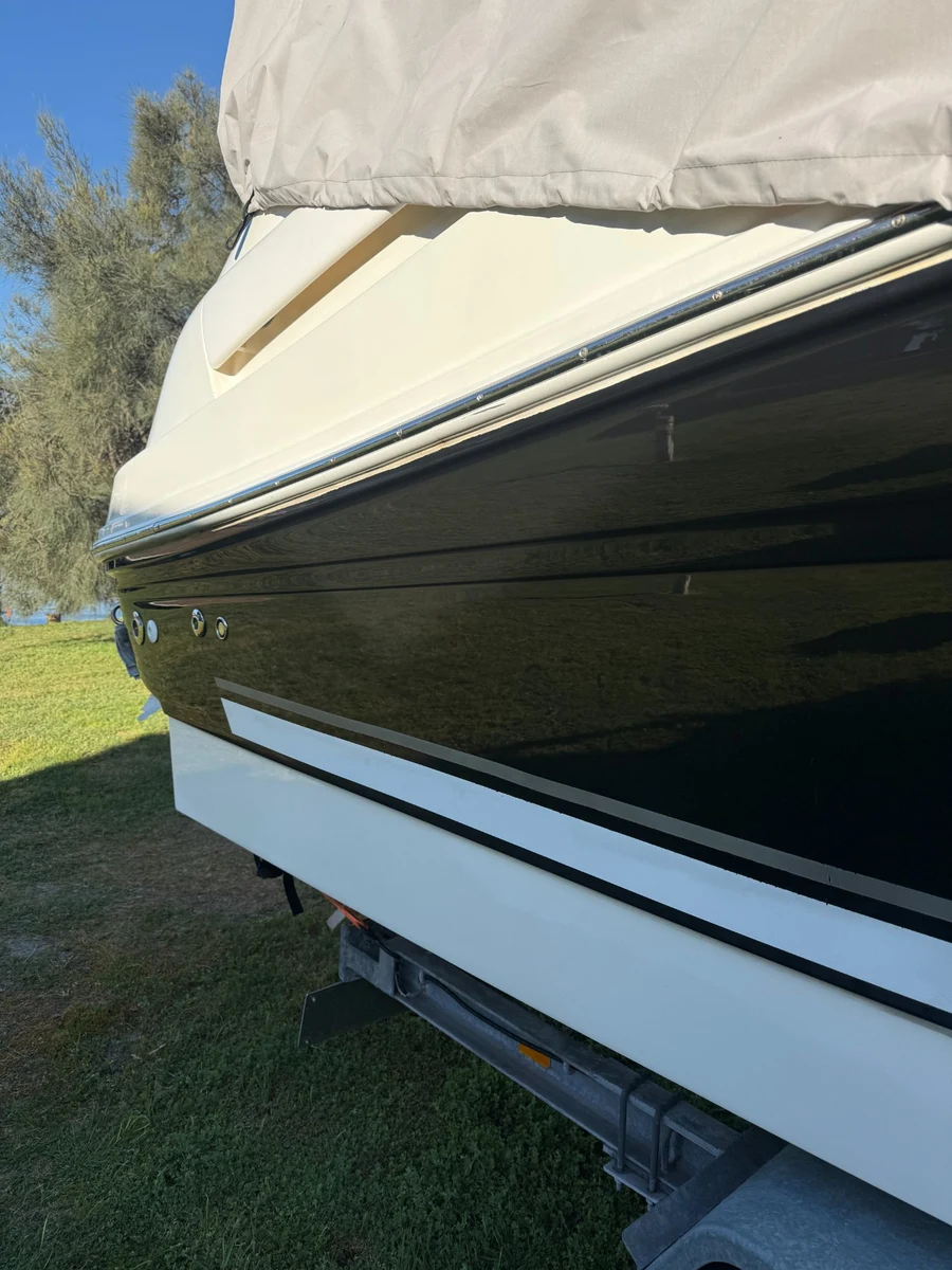 Graphene ceramic coating Perth WA — deep gloss black hull result