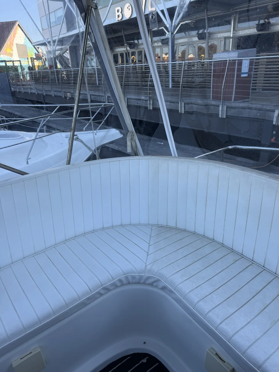 Boat interior detailing Perth WA — clean cabin seating at marina